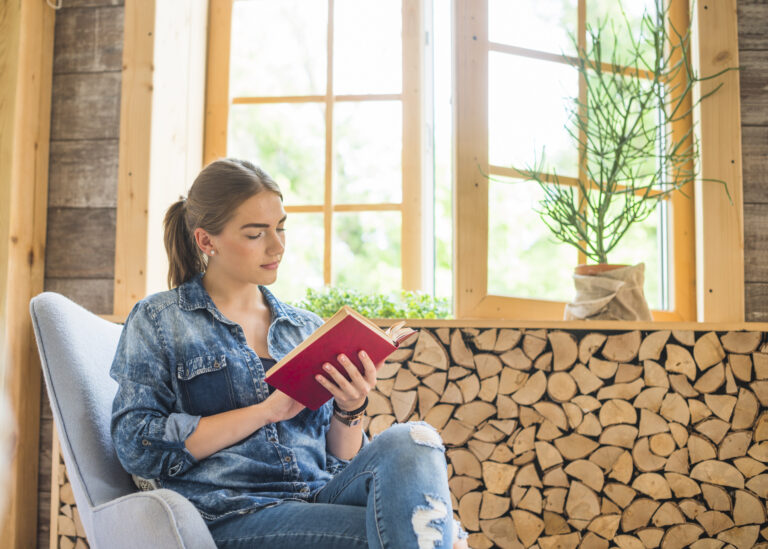 woman-reading-book-with-concentration-scaled